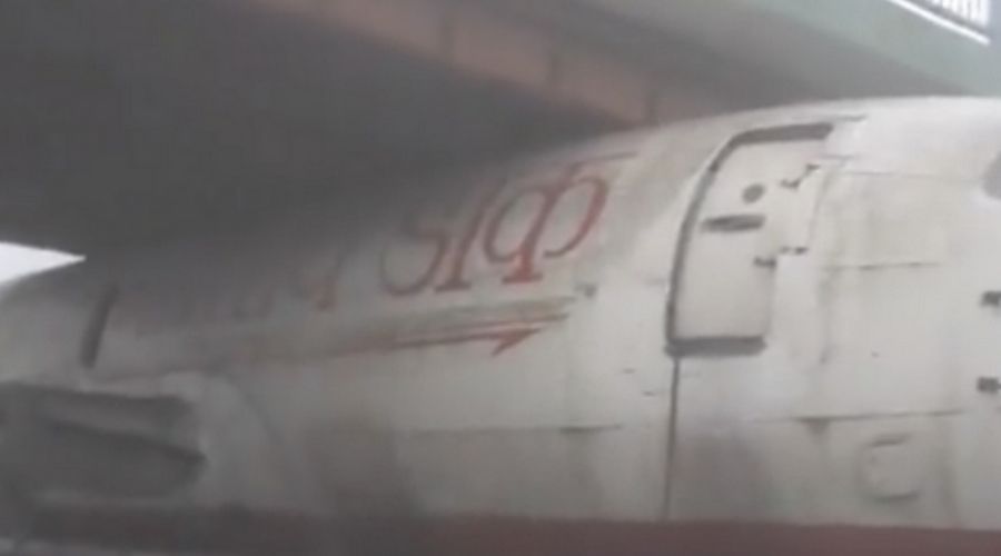Airplane Stuck Under a Bridge in India Watch Video