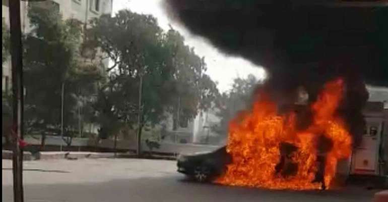 Black Sedan Bursts Into Flames At Petrol Pump In Hyderabad, India