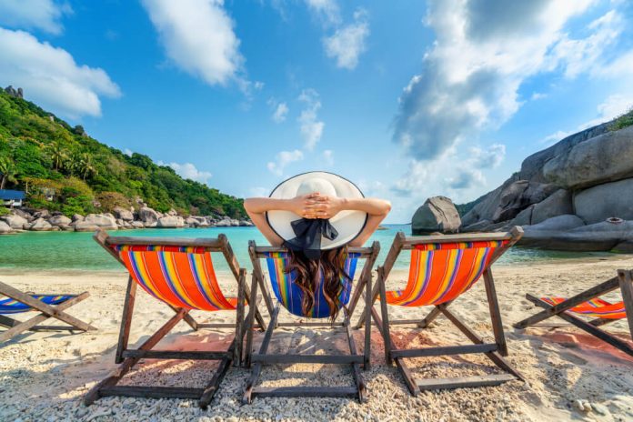 A girl sitting at the beach