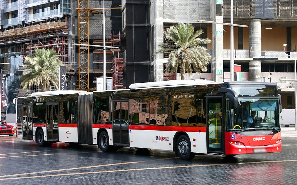 Public Bus in the UAE at a stop.