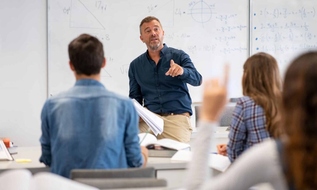 Teacher teaching in the class