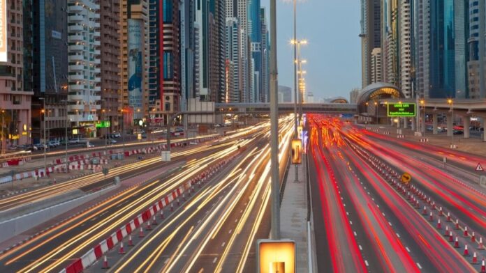 C6CE9F United Arab Emirates, Dubai, Sheikh Zayed Road, traffic and new high rise buildings along Dubai's main road